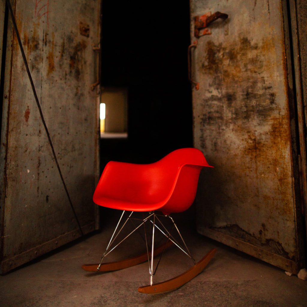 red eames rocking chair